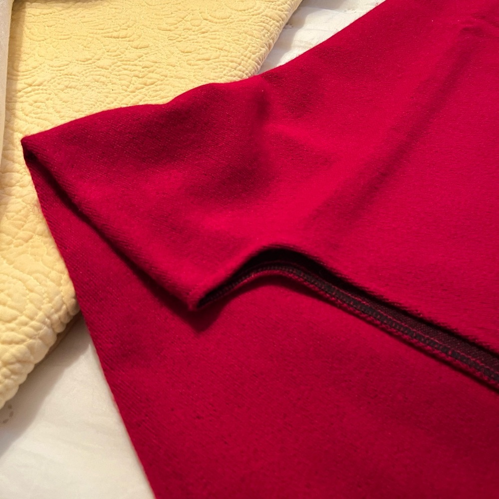 Poncho style scarf/Wrap. Front wraps 23” wide 31” neck to bottom.